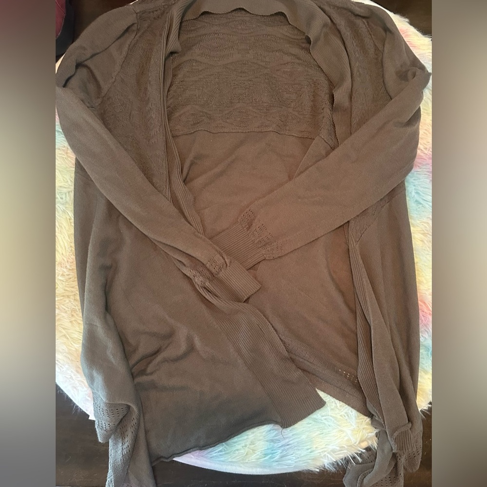 Large green open cardigan